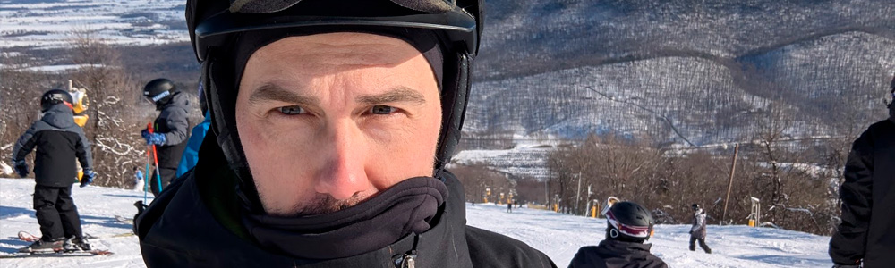 Photo of me wearing ski gear at top of ski slope